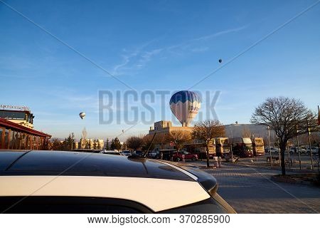 Cappadocia, Turkey - December 20, 2019: Hot Air Balloons Flying In Blue Sky With White Clouds Over O