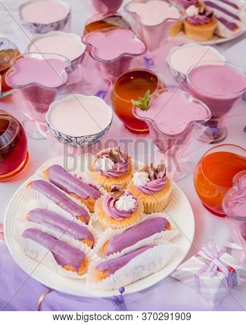 Set Of Various Cupcakes, Bright And Colorful Pink Set In Outdoor Lighting