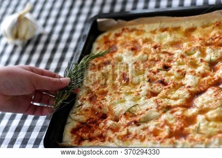 Homemade Italian Focaccia Modenese, With Rosemary And Olive Oil/ Freshly Baked Flat Bread Whit Herbs