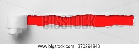 A Hole In White Paper With Torn Edges And A Red Isolated Background Inside, Ripped Red And White Pap