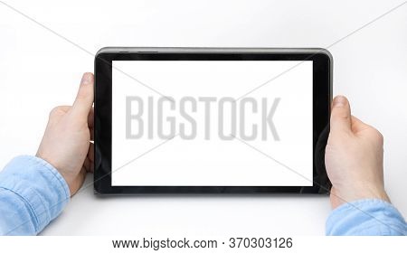 Male Hands Holding Digital Tablet Blank Screen On White Background. Take Your Screen To Put On Adver