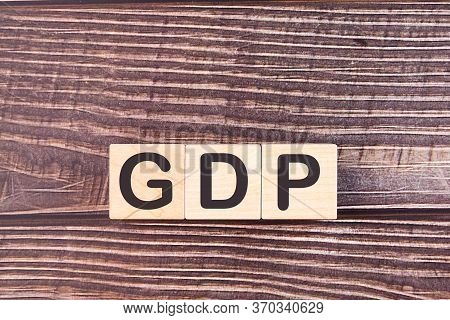 Gdp, Gross Domestic Product Concept, Cube Wooden Block With Alphabet Combine Abbreviation Gdp, Measu