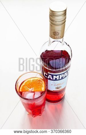 Moscow, Russia - June 4, 2020: Top View Of Glass With Cocktail And Closed Bottle Of Campari Bitter O