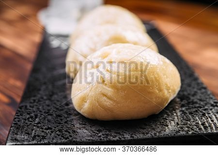Closeup On Korean Steamed Pjan-se Pigodi Pies With Cabbage And Meat , Horizontal