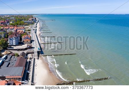 Top View Of The Baltic Sea Coast. You Can See The Resort Town Of Zelenogradsk, The Promenade, Breakw