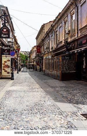 Empty Tables At Local Restaurants In Old Town Bucharest Due To Coronavirus Worldwide Outbreak Crisis