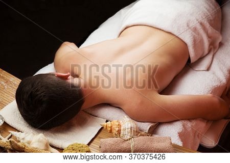 Young Man Caucasian Procumbent In Spa Salon