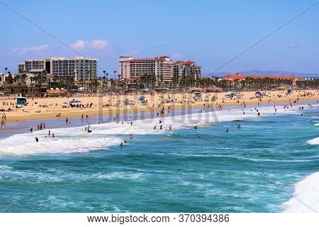 June 7, 2020 In Huntington Beach, Ca:  Modern Resort Hotels Surrounding A Vast Sandy Beach And The P