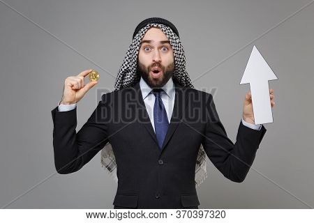 Amazed Bearded Arabian Muslim Businessman In Keffiyeh Kafiya Ring Igal Agal Black Suit Isolated On G