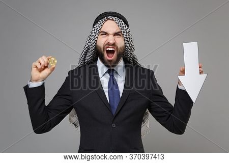 Irritated Arabian Muslim Businessman In Keffiyeh Kafiya Ring Igal Agal Black Suit Isolated On Gray B