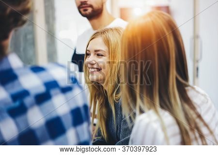 Young It Programmers Collaborating On Creating Application Using Digital Computers