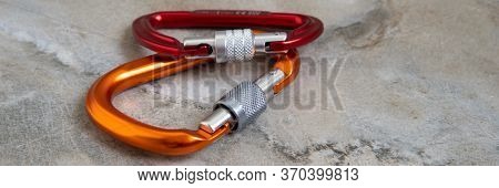 Screw Gate Carabiners On A Marble Top