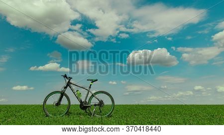 Khmelnitskiy Ukraine 06.06.2020 Cycling Travel Life Style Concept Of Cycle Stay On Idyllic Green Fie
