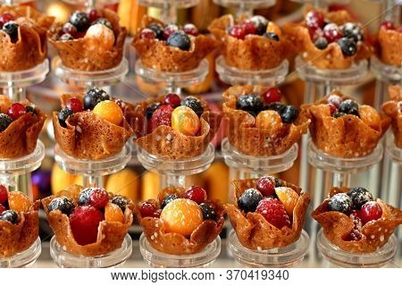 Brandy Snap Cookies With Fresh Wild Berries