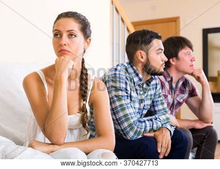 Portrait Young Unhappy Woman In Polygamous Family Indoors