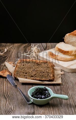 Close Up Homemade Delicious Freshly Baked Classic Sweet Banana Bread Sliced With Blueberry/strawberr