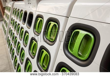 Taipei, Taiwan - August 17th, 2019: charging station for battery packs of Taiwan-based Gogoro electronic motocycle at street in Taipei, Taiwan, Asia
