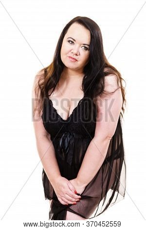 Plus Size Fat Woman Wearing Black Lace Lingerie Babydoll Showing Her Chest Breasts. Bosom Concept.