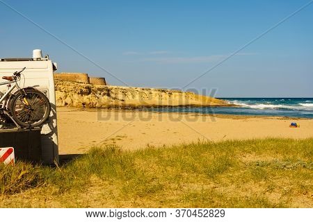 Camper Car With Bike On Rack Camping On Sea. Beach El Playazo, Cabo De Gata Nijar, Province Almer
