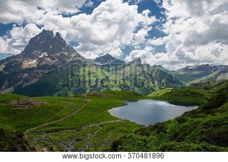 View Of Pic Du Midi Ossau And Ayous Lake In The French Pyrenees Mountains