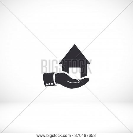 House In The Hand. Hand Holds The House. Warm And Reliable. Vector Graphics Of Home And Hands. Icon 