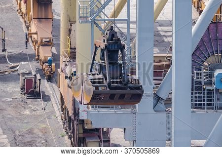 Seaport - Bucket And Transshipment Cranes At The Transshipment Terminal Quay