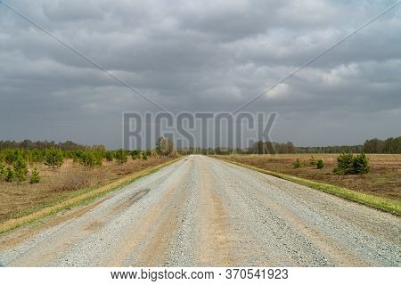 Background Image Of A Road Going Into The Distance. Asphalt Road. Highway. Road Markings. A Road Run