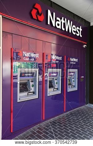 London, Uk - July 6, 2016: Cash Machines Of Natwest Bank Branch In London. National Westminster Bank