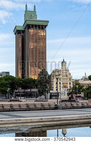 Madrid, Spain - June 7, 2020: The Towers Of Colon Office Building From Gardens Of Discovery