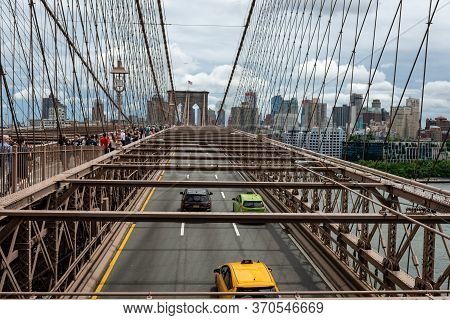 New York, Usa - June 21, 2019:  Road Traffic Over Brooklyn Bridge.