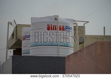 Twin White Sintex Water Tank On The Roof Of A House Or Industrial Building On Roof Top Or Deck. : Ud
