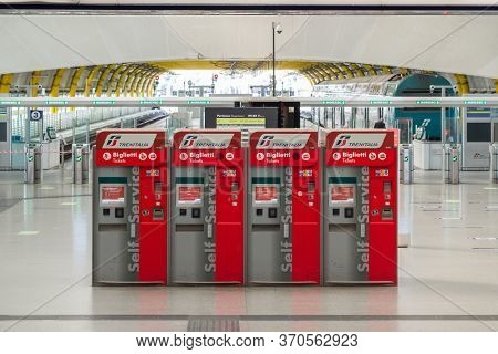 Rome, Italy - june 3, 2020: Ticket machines for trenitalia trains at train station in departure terminal 3 in Rome Fiumicino Airport, Rome, Italy