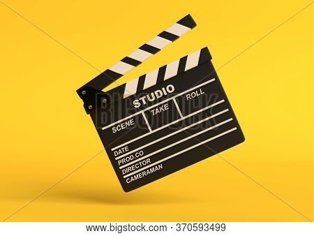 Flying сlapperboard Isolated On Bright Yellow Background In Pastel Colors. Minimalist Creative Conce