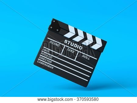 Flying сlapperboard Isolated On Bright Blue Background In Pastel Colors. Minimalist Creative Concept