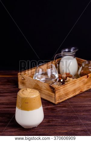 Dalgon Coffee With Ingredients For Its Preparation In A Box On A Wooden Background. Instant Coffee, 