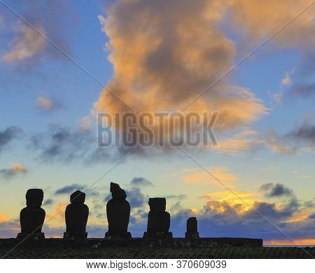 Moai On Easter Island At Ahu Akivi At Sunset.