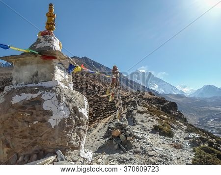 White Stupa, Prayers Flags And Amazing Landscape In The Everest Base Camp Trek In Nepal