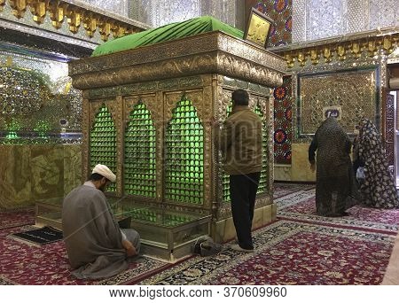 Shiraz, Iran - 2019-04-09 - Shah Ceragh Shrine - Men Pray At Mirrored Tomb Of Mullah.