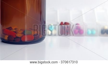 Ferrous Fumarate In Pill Box With Tablets, Capsules, Vitamins In Brown Bottle For Treatment Iron Def