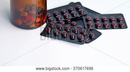 Ferrous Fumarate Pills In Packs With Tablets, Capsules, Vitamins In Brown Bottle For Treatment Iron 