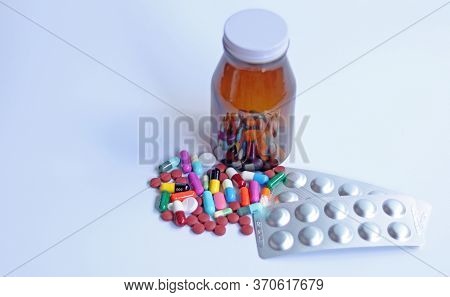 Ferrous Fumarate Pills, Blister Packs With Color Tablets, Capsules, Vitamins In Brown Bottle For Tre