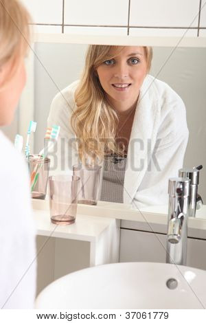 portrait of blonde in bathroom
