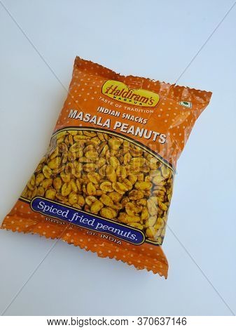 Plastic Pack Of Haldirams Masala Peanut, 50 G Pouch Isolated In A White Background