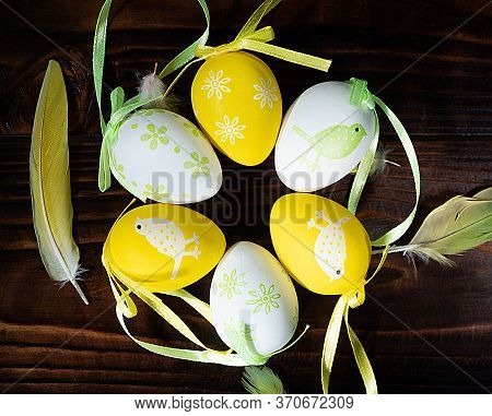 A Easter Eggs On A Wooden Background