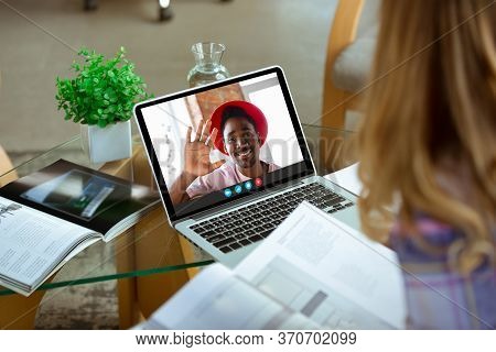 Businesswoman Participate Video Conference Looking At Laptop Screen During Virtual Meeting, Videocal