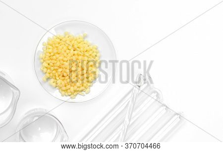 Candelilla Wax Sp-75. Chemical Ingredient For Cosmetics & Toiletries Product On White Laboratory Tab