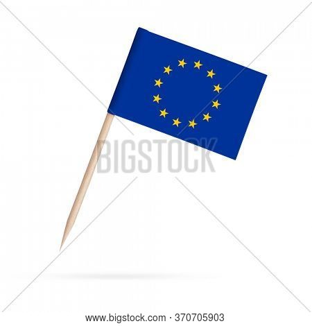 Miniature paper flag European Union. Isolated Eu toothpick flag on white background. With shadow below