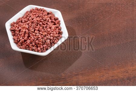 Organic Achiote Seeds - Bixa Orellana. Text Space