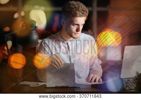 Double Exposure Of Young Man Working In Office And Cityscape. Financial Analytics