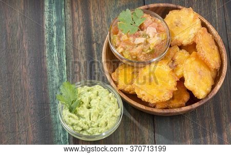 Patacón Fried Flattened Pieces Of Green Plantain (tostón, Tachino)